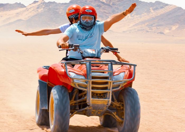 A-wonderful-shot-of-two-people-riding-a-quad-bike-from-one-of-the-safari-trips-in-Hurghada